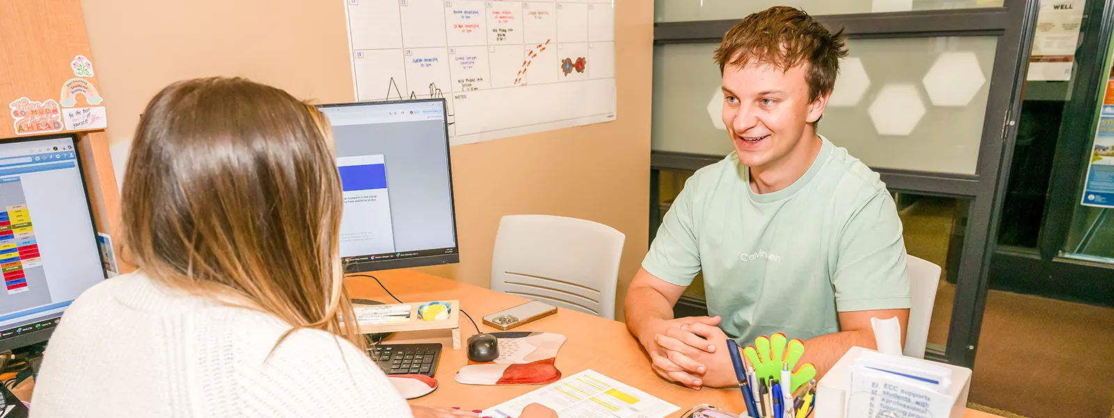 Student meeting with an ECC advisor
