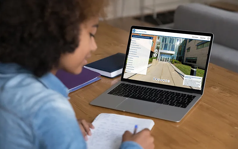 A student studying on a laptop