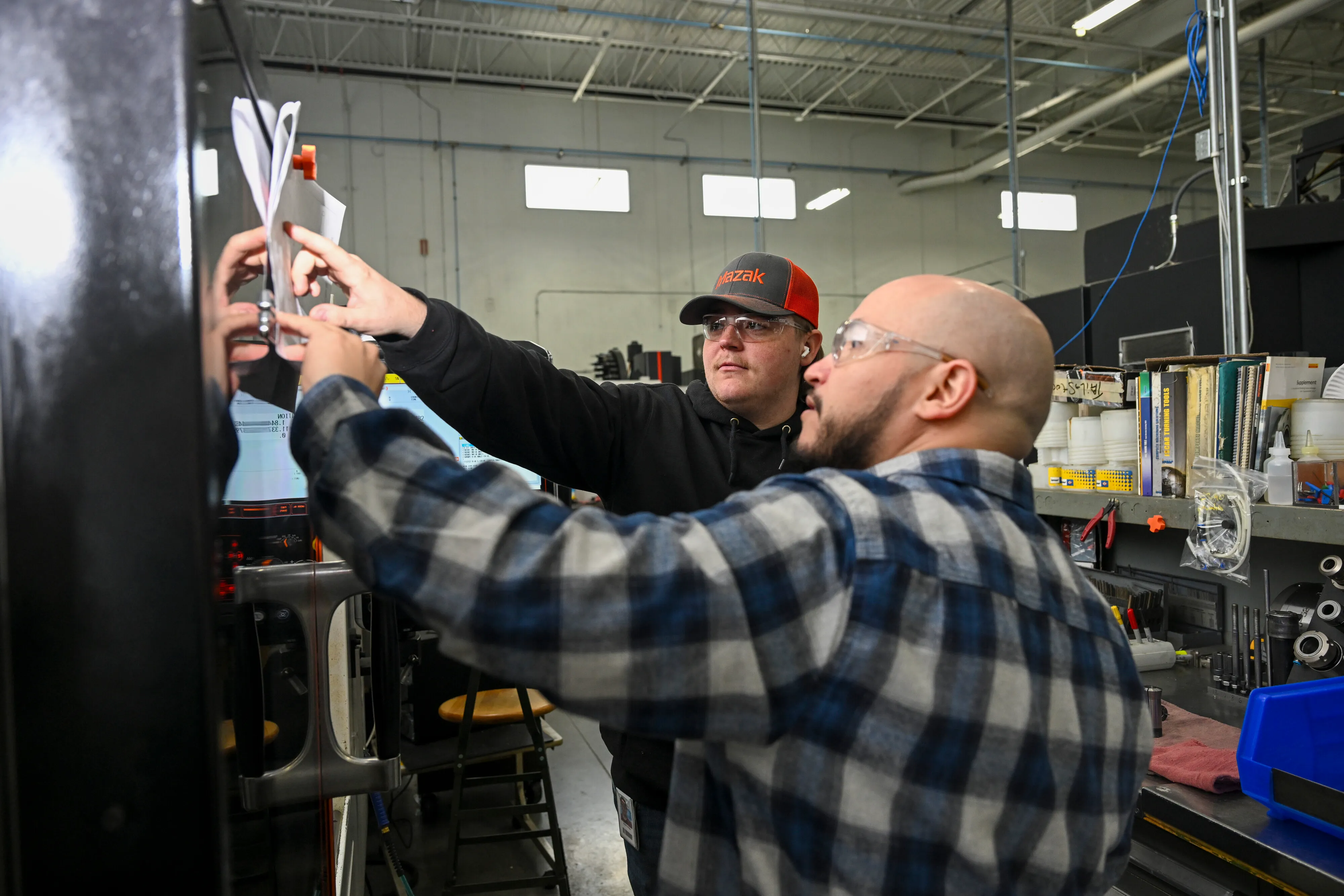 An ECC apprentice getting on-the-job training