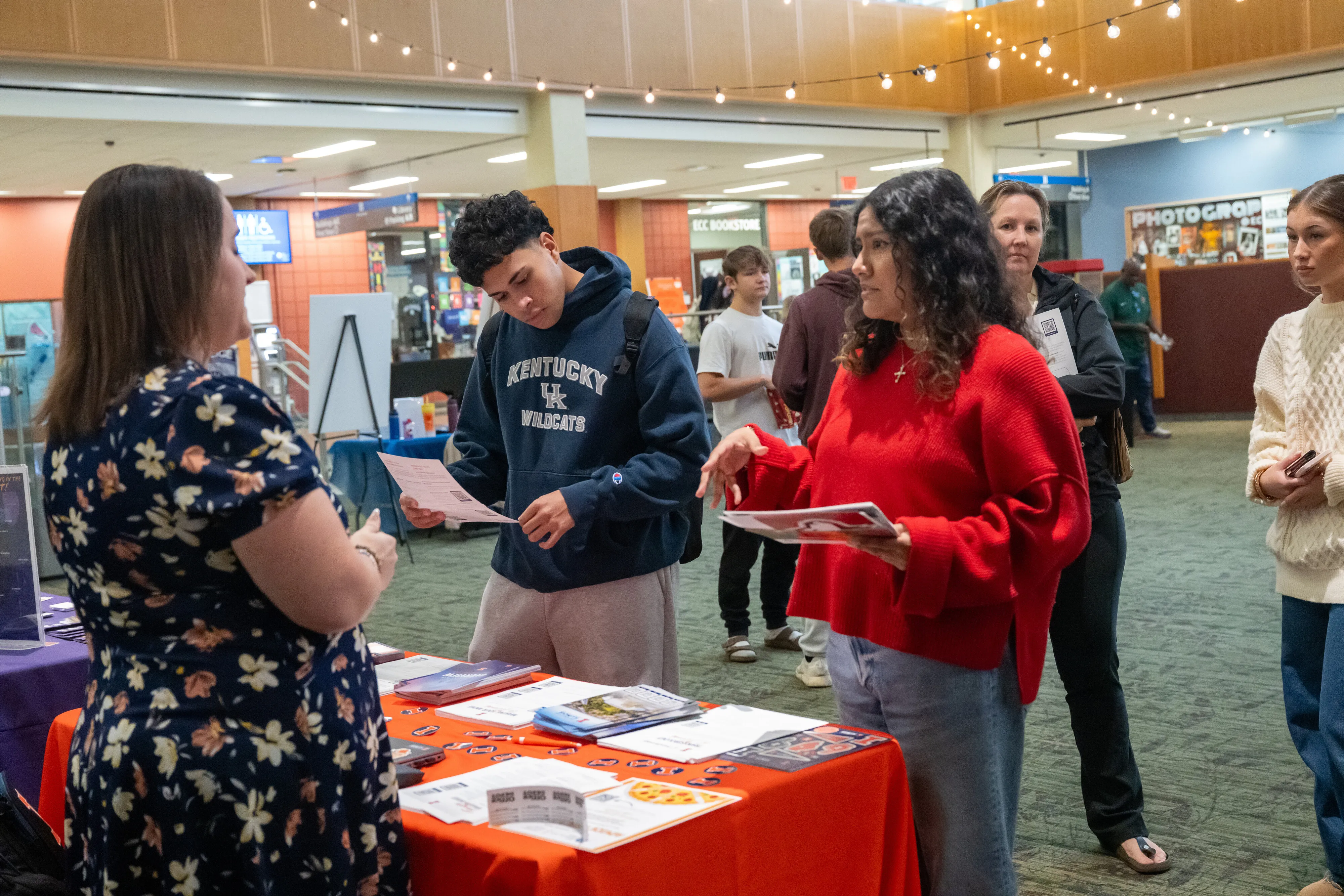 ECC students chat with different tables at a past College Night event.