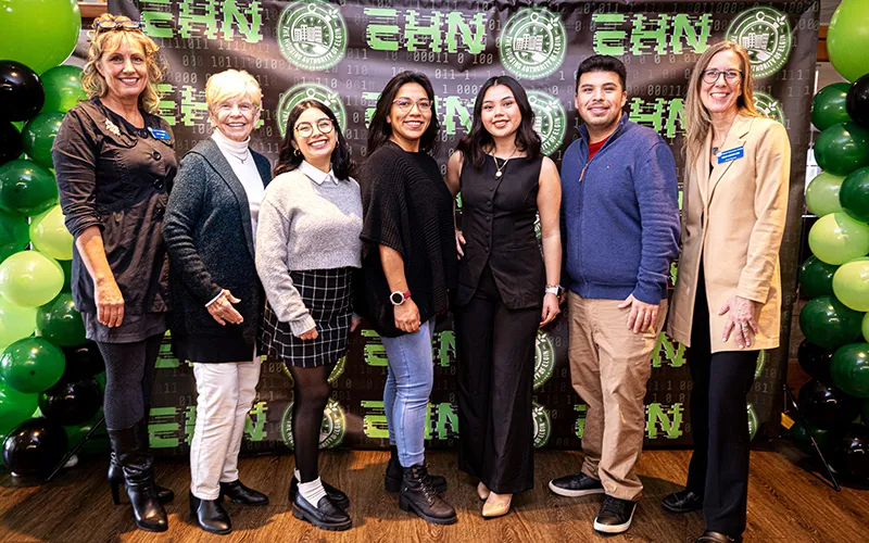 From left to right: ECC Board Trustee Jennifer Rakow, ECC Board Chair Donna Redmer, students Aolany Campuzano, Sirlene Machicado, Valeria Hernandez, Jonathan Aguina, and ECC Interim President Dr. Peggy Heinrich
