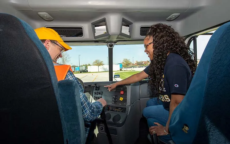 Sharla Suggs, instructor of truck driving, trains a student