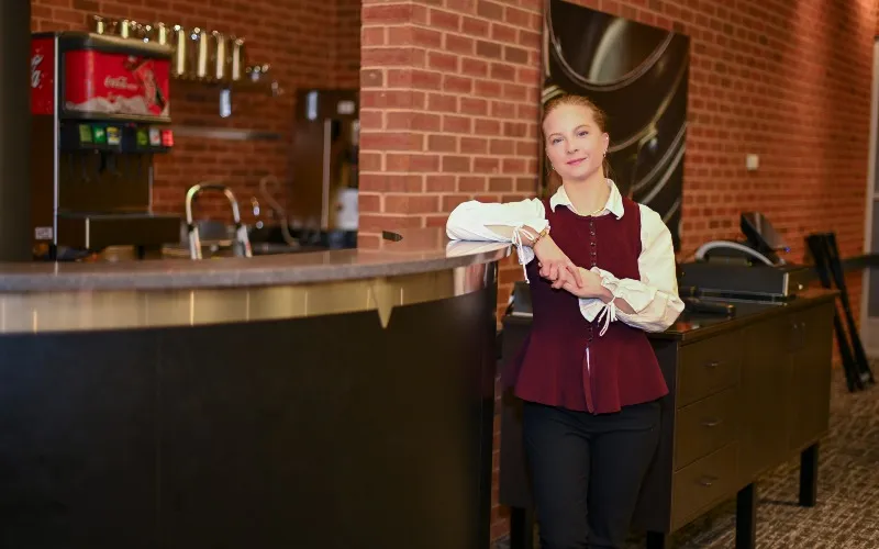 ECC culinary and pastry arts, and hospitality management student Abby Hendrickson poses in the Spartan Terrace Restaurant.