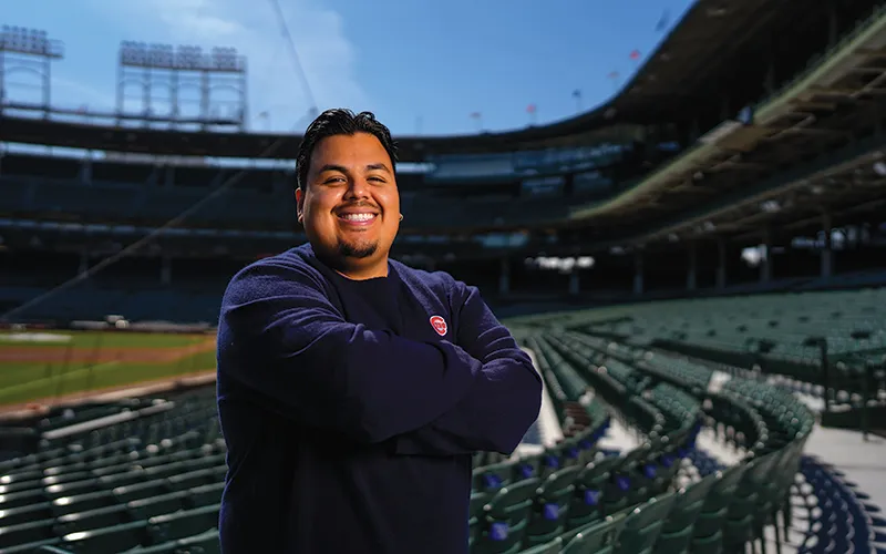 ECC Alum Fredy Quevedo Jr. enjoying the friendly confines of Wrigley Field.