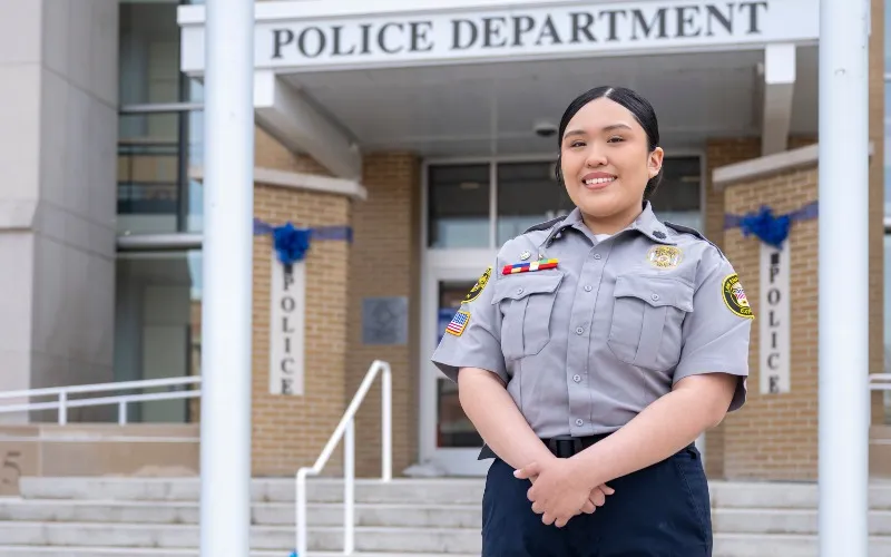 Jasmin Perez, ECC student, and law enforcement explorer, outside the Elgin Police Department.