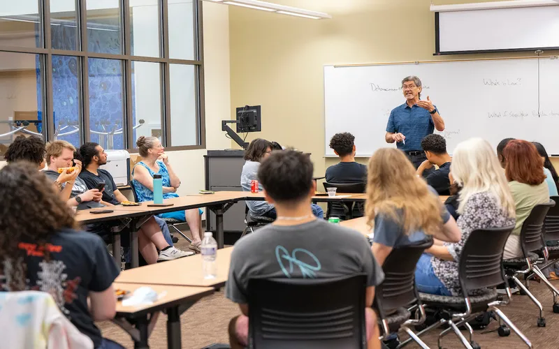 Professor David Zacker facilitates a discussion at the Socrates Cafe club at ECC.