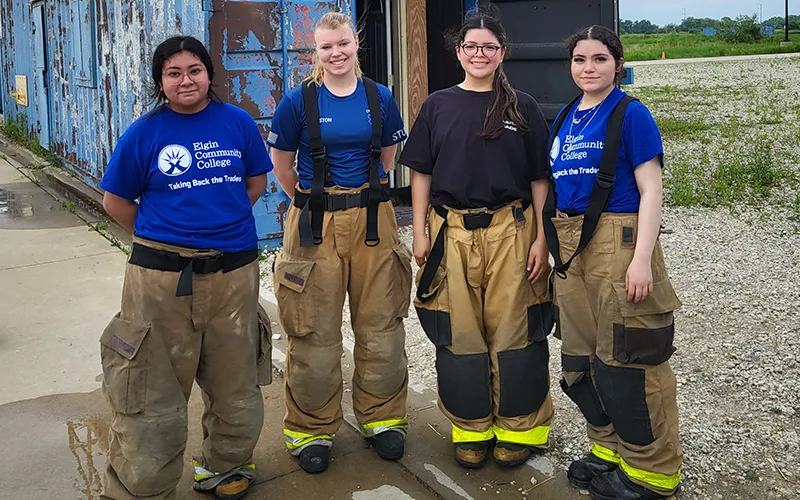 The four pre-apprentices in the Girls on Fire program pose for a photo.