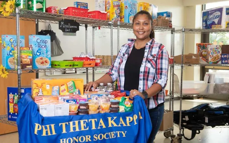ECC Student Maria Perez and the new Mobile Spartan Pantry Cart