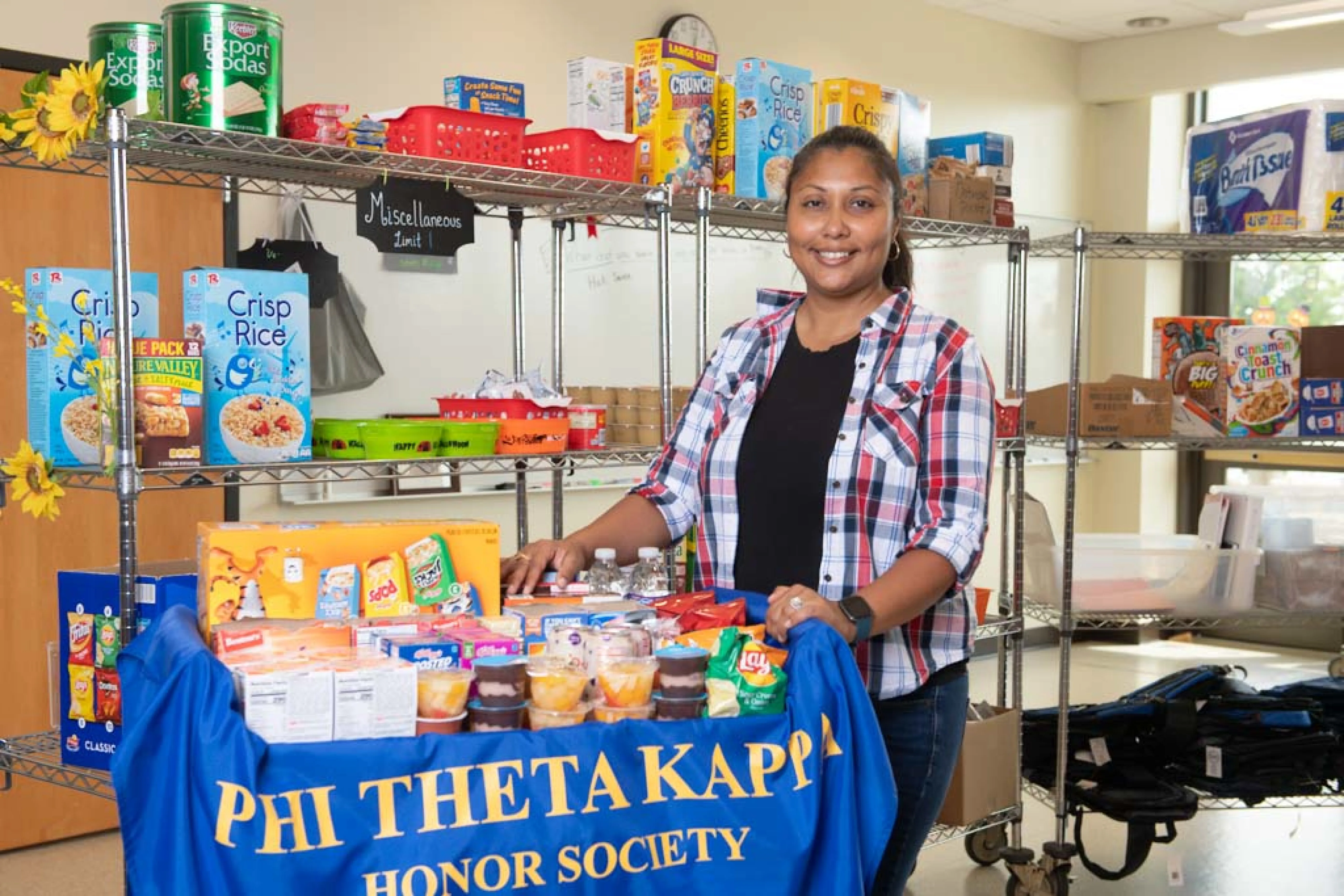 ECC Student Maria Perez and the new Mobile Spartan Pantry Cart