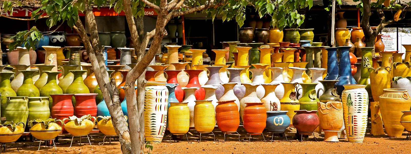 International image of pots lined up in rows in Ghana