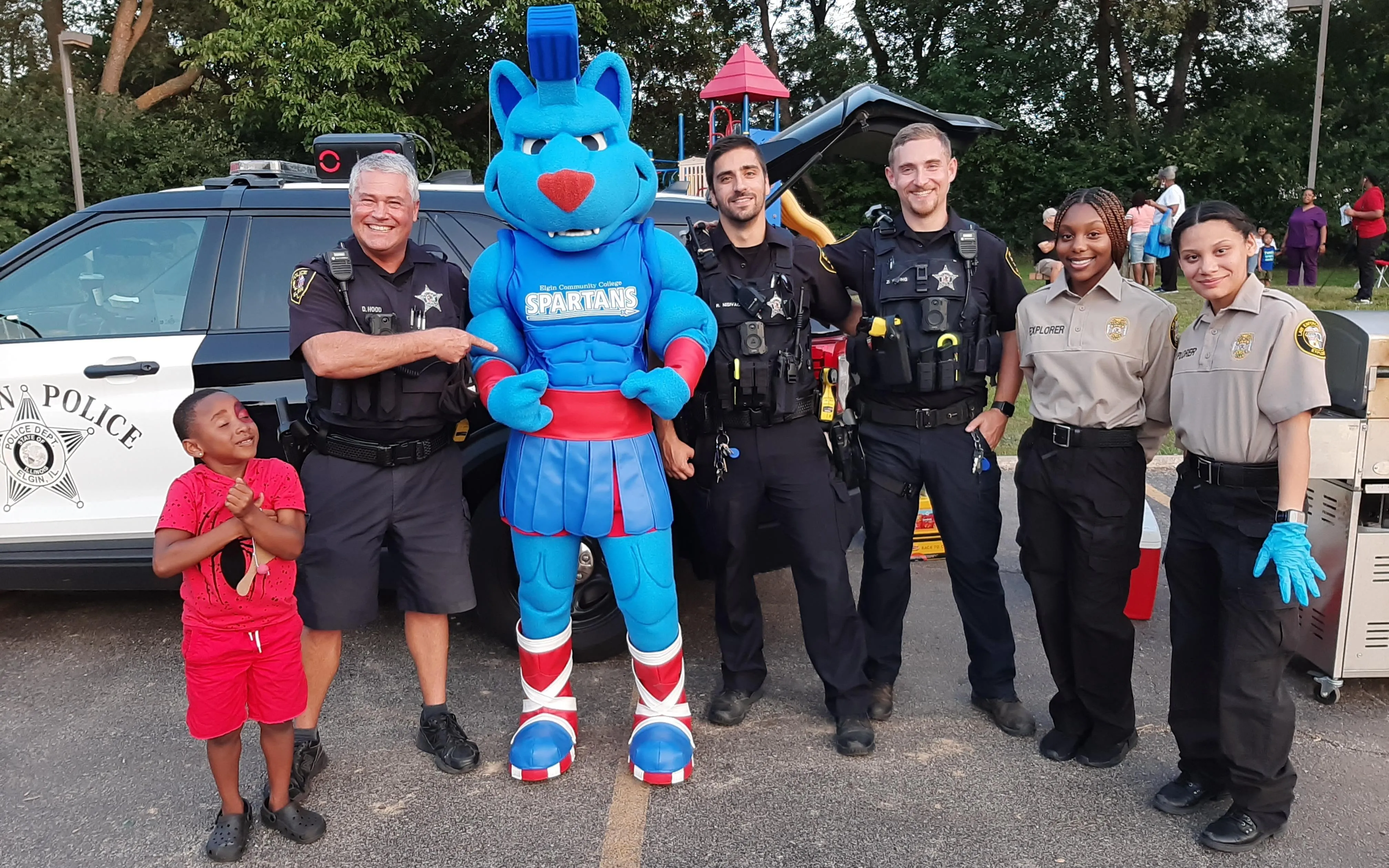 Spartacat with Elgin Police Department officers