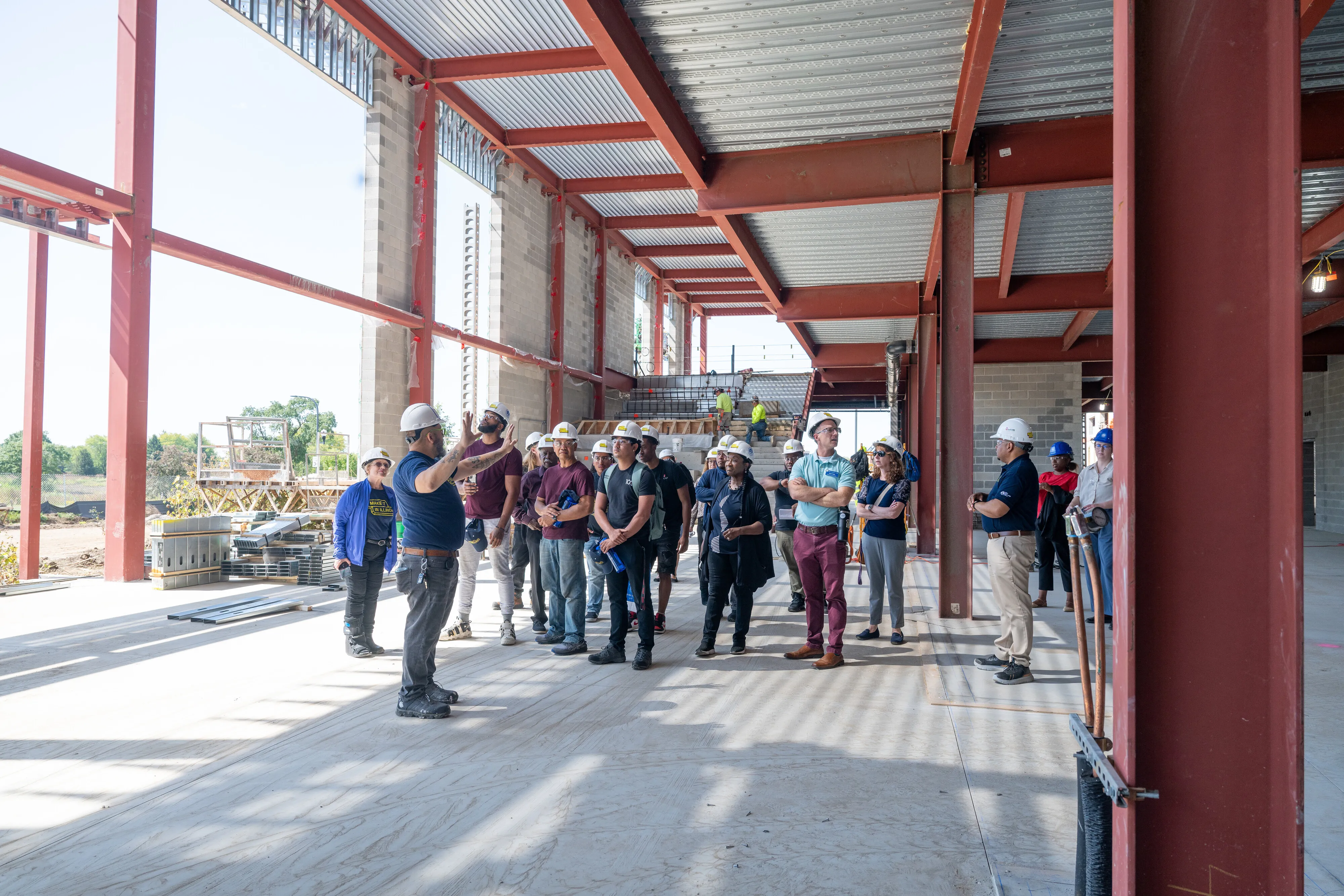 A group tours the Manufacturing and Technology Center