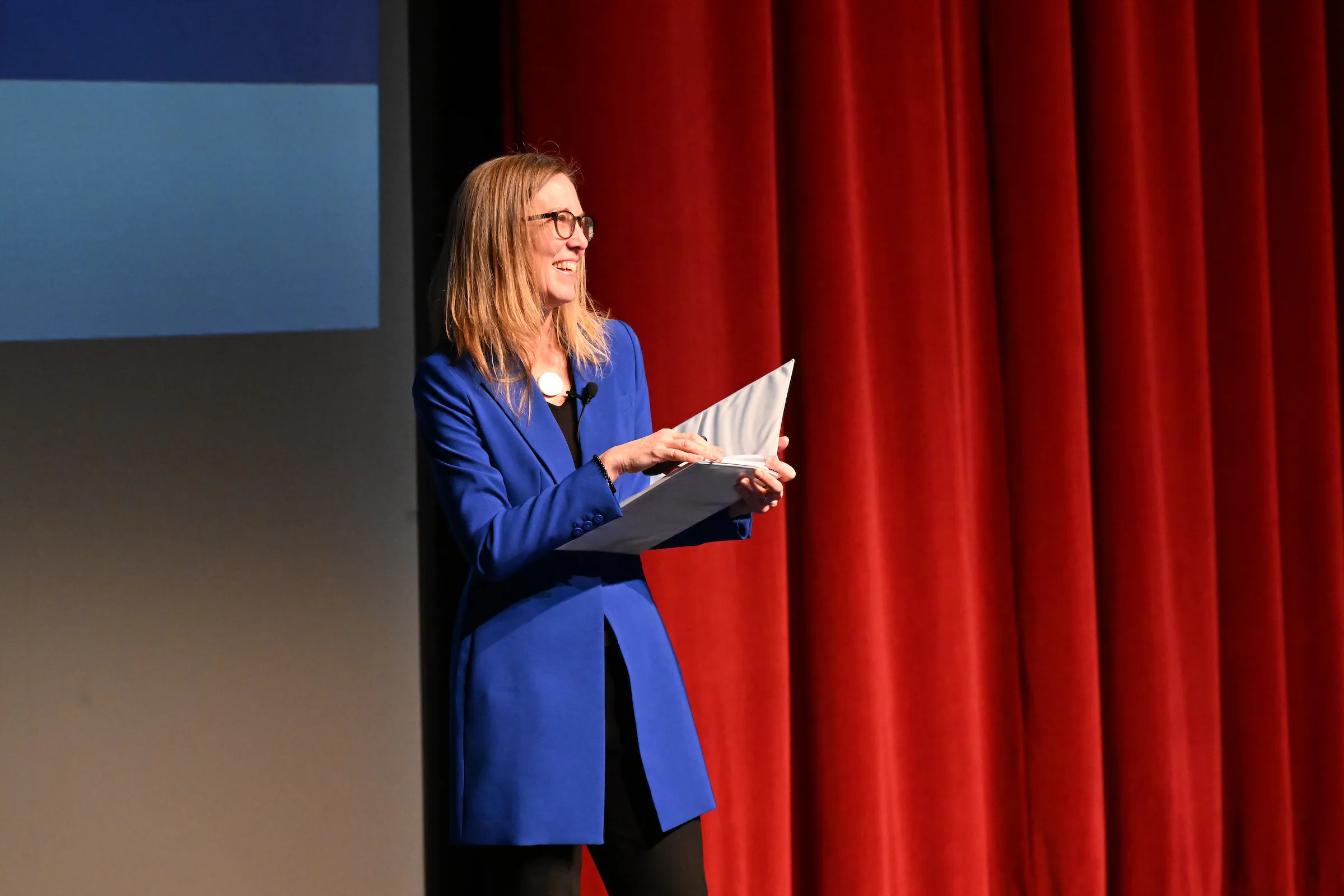 Dr. Heinrich on stage at convocation