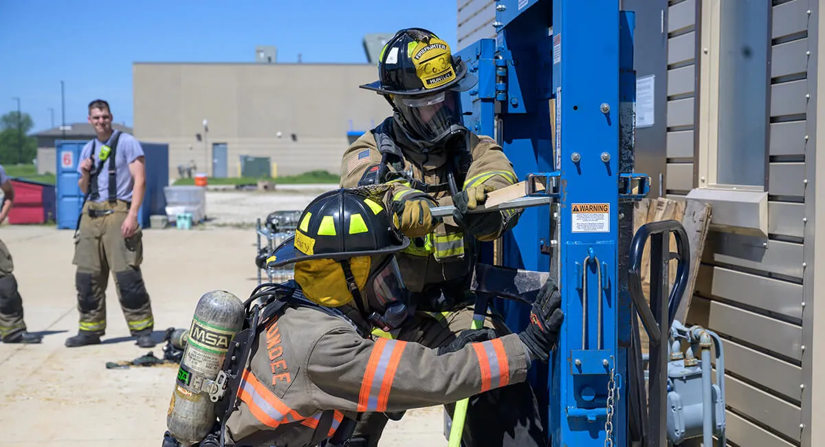 Firefighters practicing forcible entry training on the Humbler