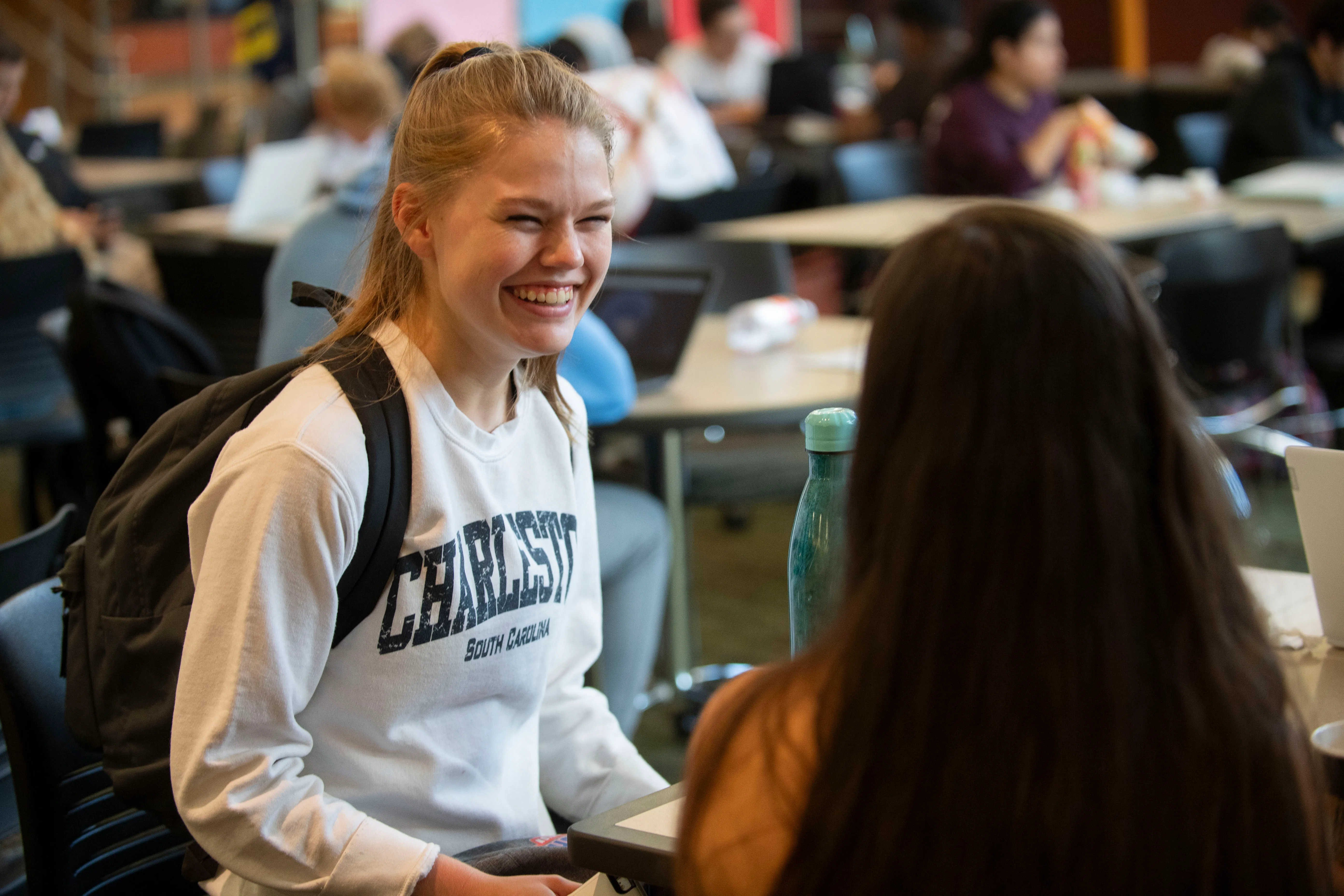 Student smiling in Jobe Lounge