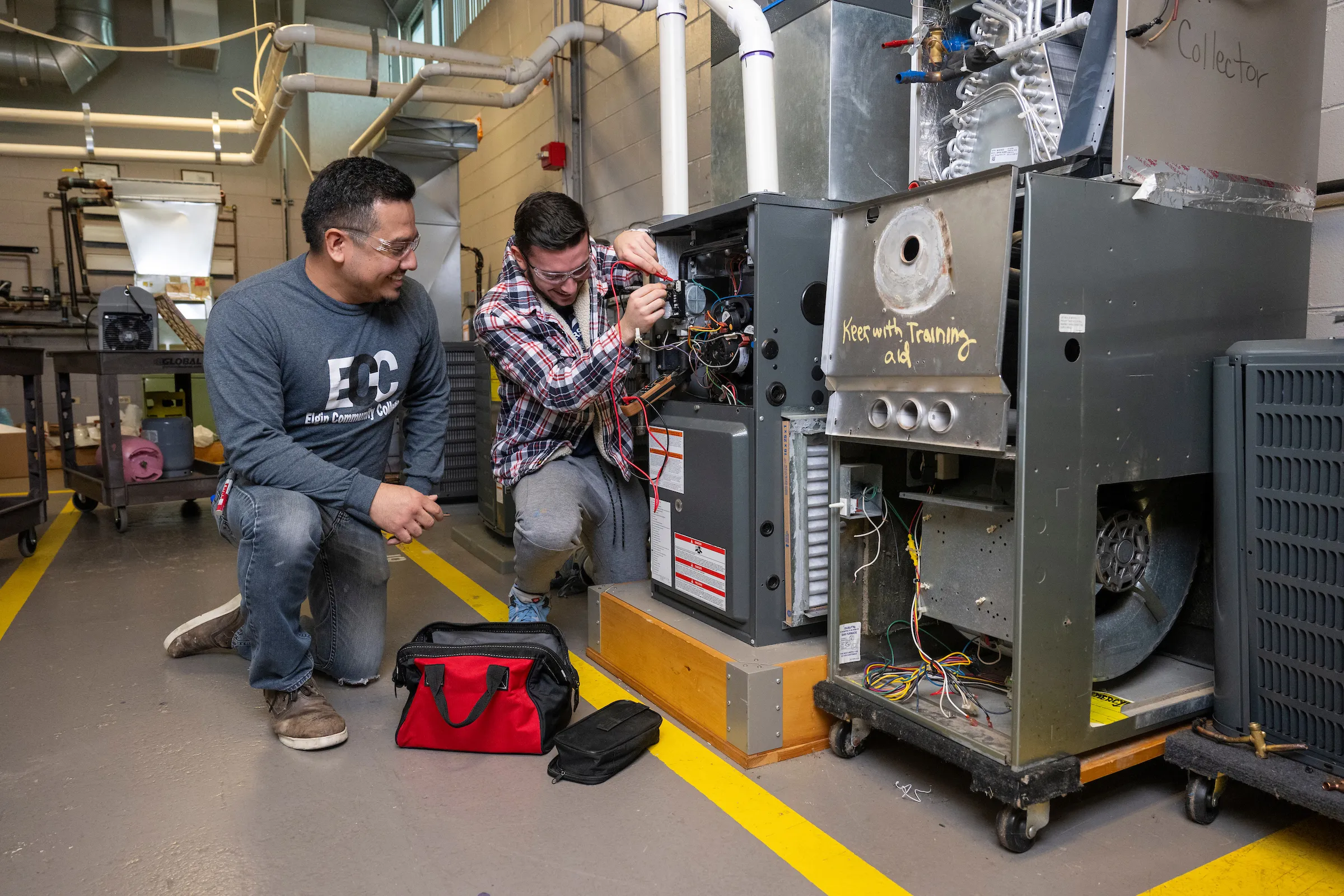Students working on HVAC systems
