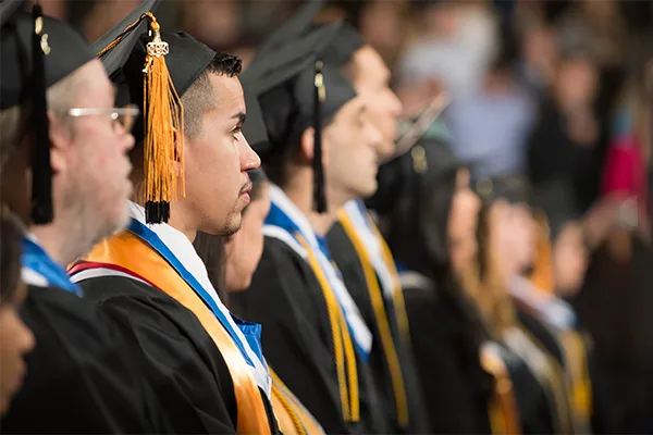 students in line graduating