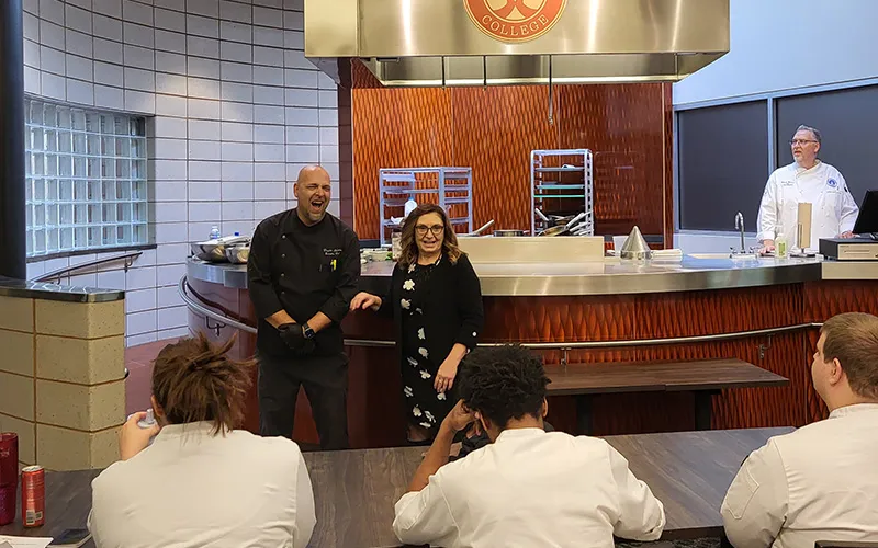 Visiting Chef Douglas Yeomans and Kim Rother speak to students in Spartan Terrace