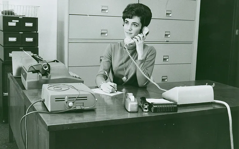 Professional woman on the phone in the office