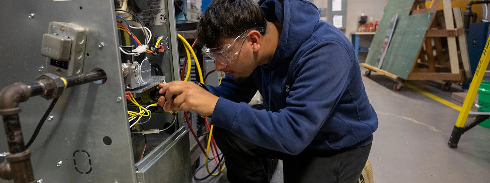 student working on wiring
