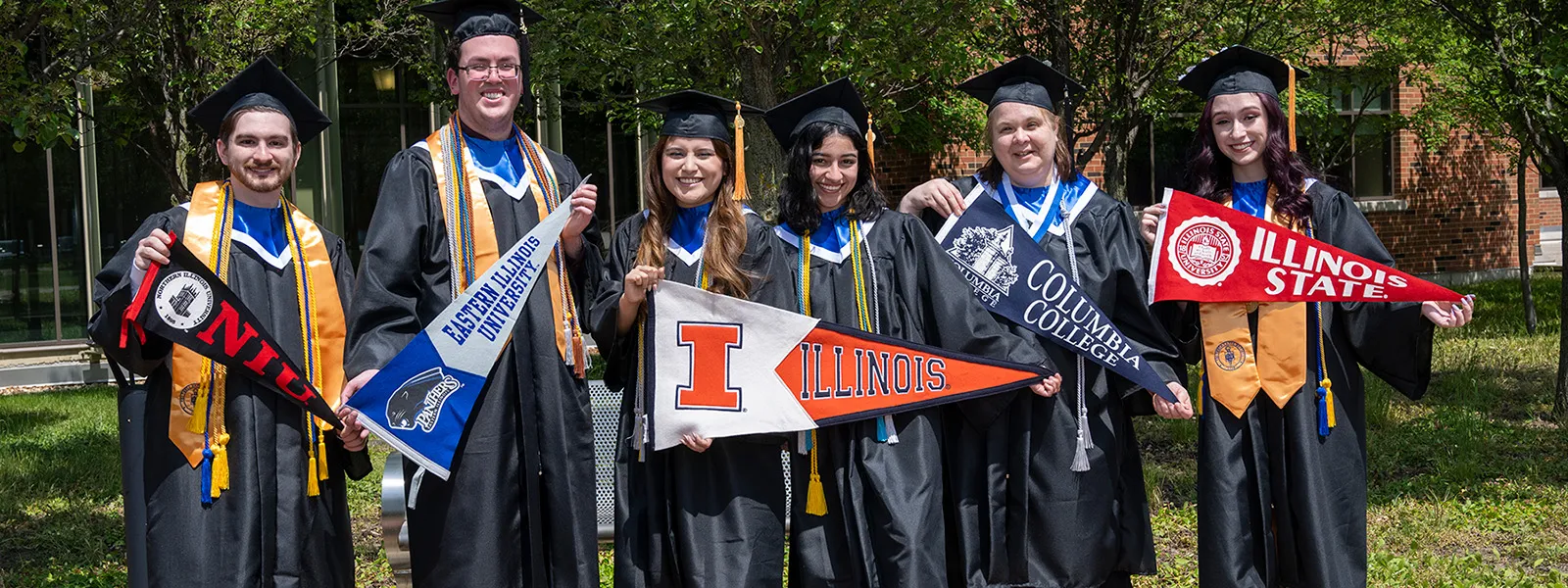 ECC students holding signs for four year colleges