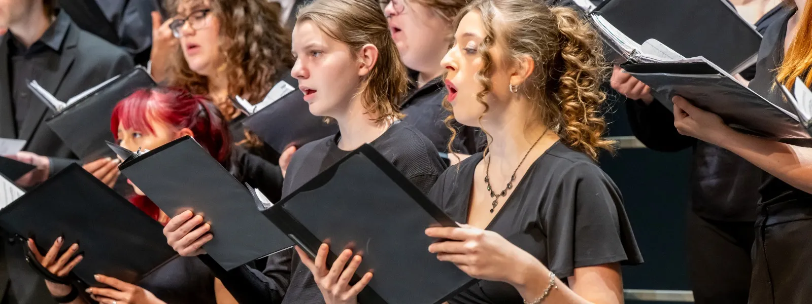 Students performing in the concert choir ensemble