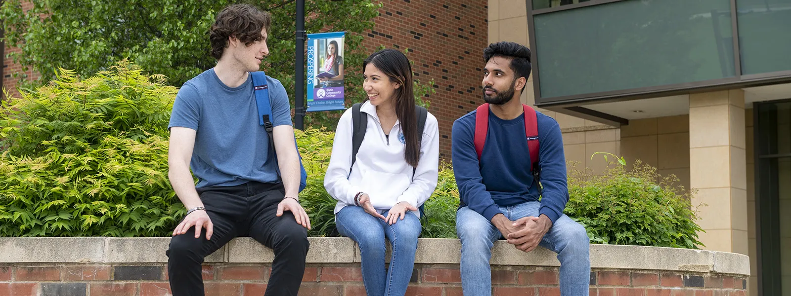 students outside the library chatting