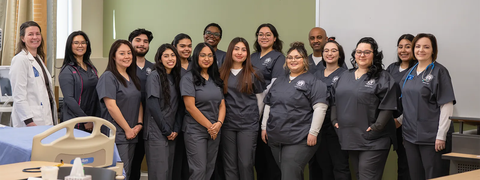 Instructor assisting student in respiratory care