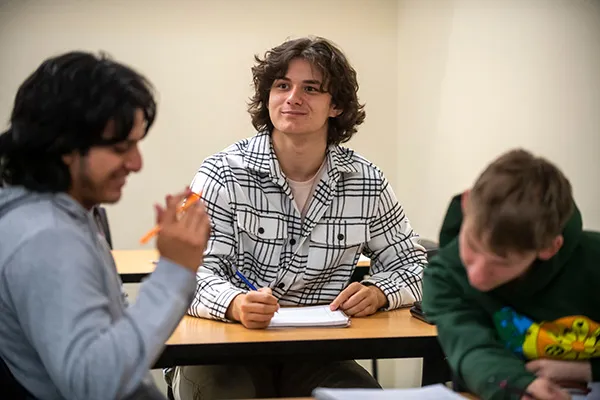 Group of students studying in a class