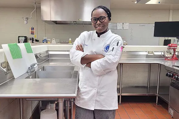 Wilna posing in a kitchen