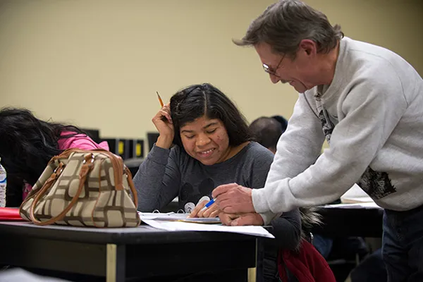 Teacher talking to a student