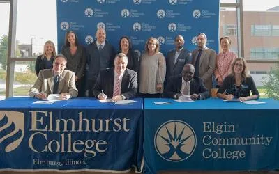 Administrators and Elmhurst College and ECC during signing ceremony