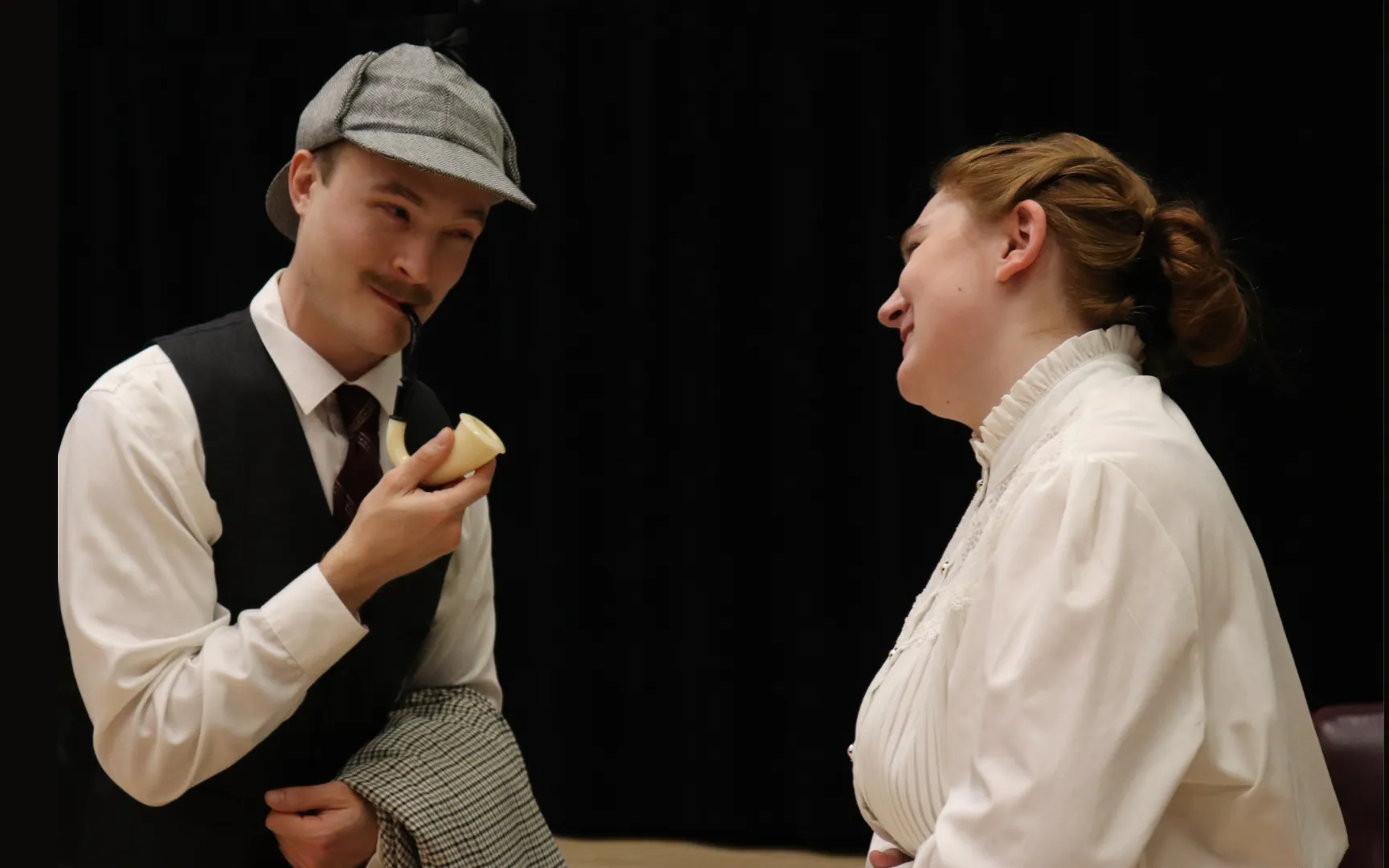ECC students Brett Barry and Anika Thorenson in “The Game’s Afoot or Holmes for the Holidays”