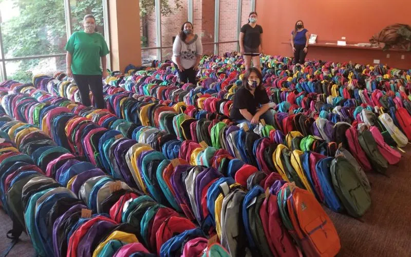 Backpacks ready for local students.
