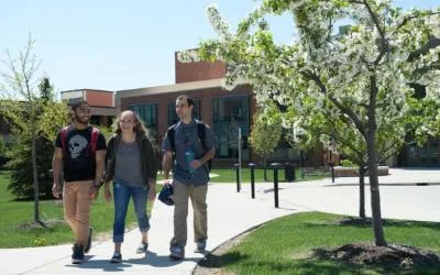 Students walking outside Building C on Elgin Community College's campus