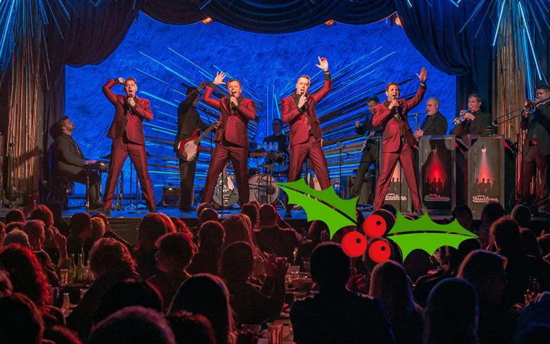 A group of performers on a stage