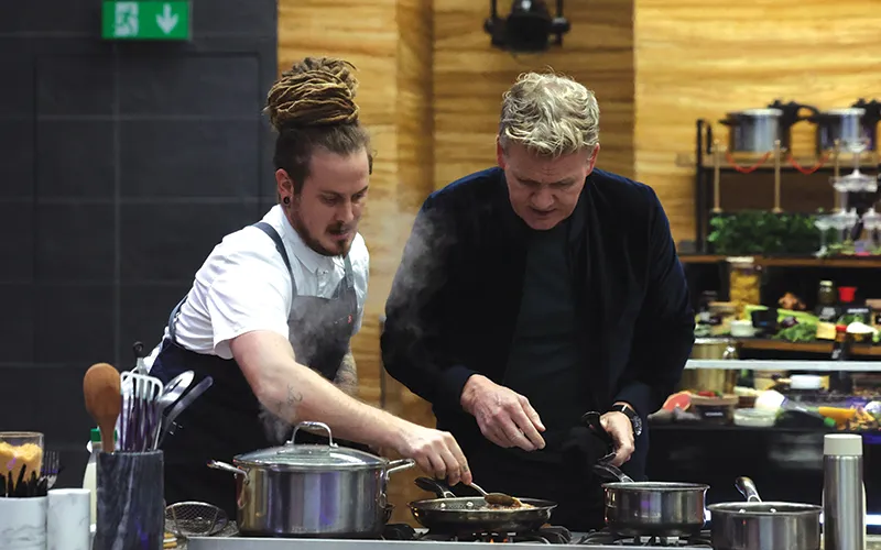 ECC culinary arts alum with Gordon Ramsay on the set of 