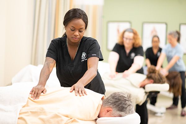 Students in massage therapy class